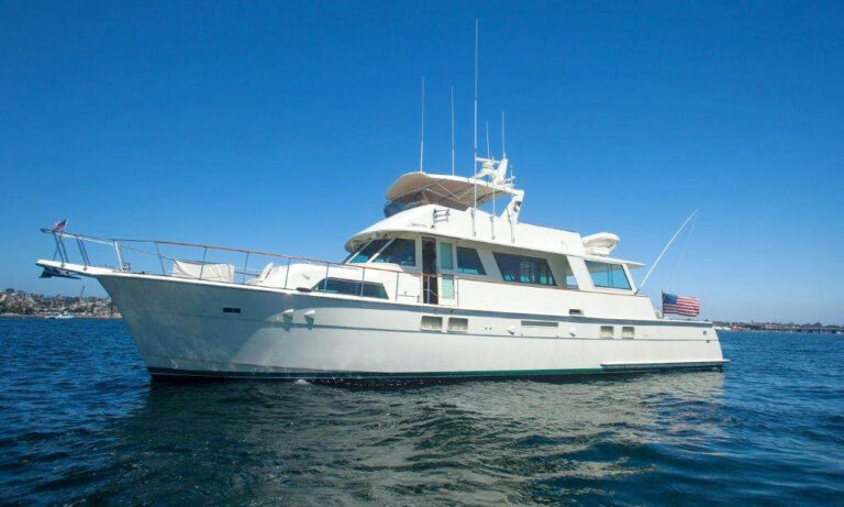 70' flybridge motor yacht cruising off Cabo San Lucas