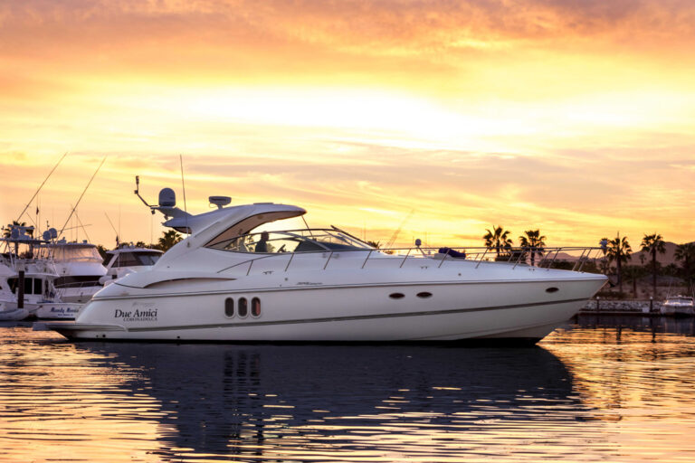 52' Cruiser Express yacht in the marina at sunset