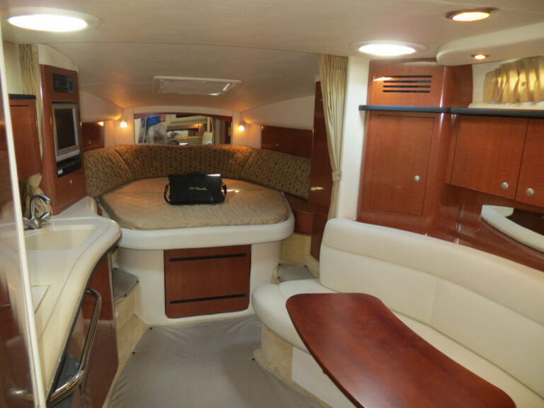 Cabin with dinette and seating on the 32' Sea Ray