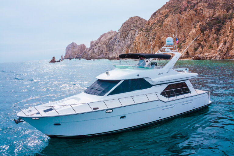 60' Bayliner cruising near Land's End, Cabo San Lucas