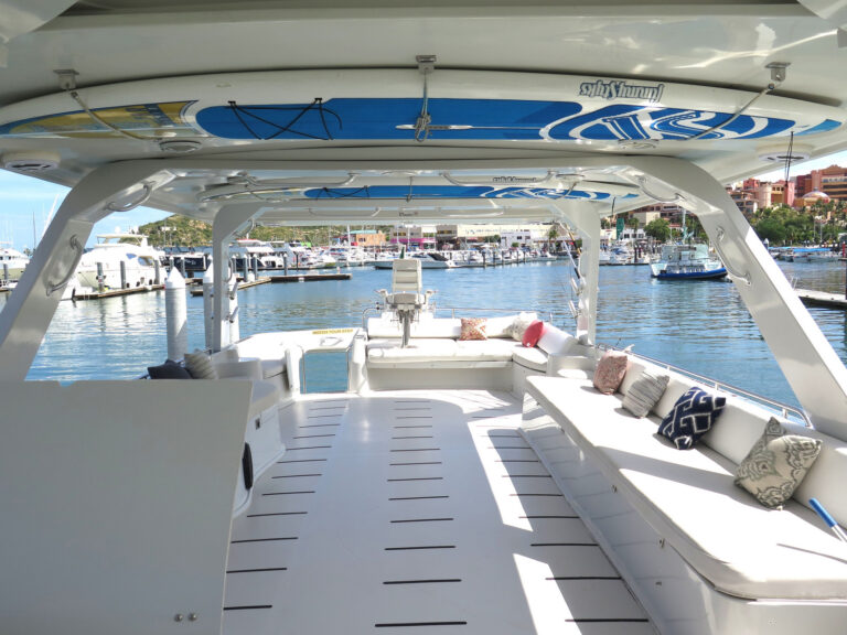 Deck lounge seating aboard the 72' Blue Water