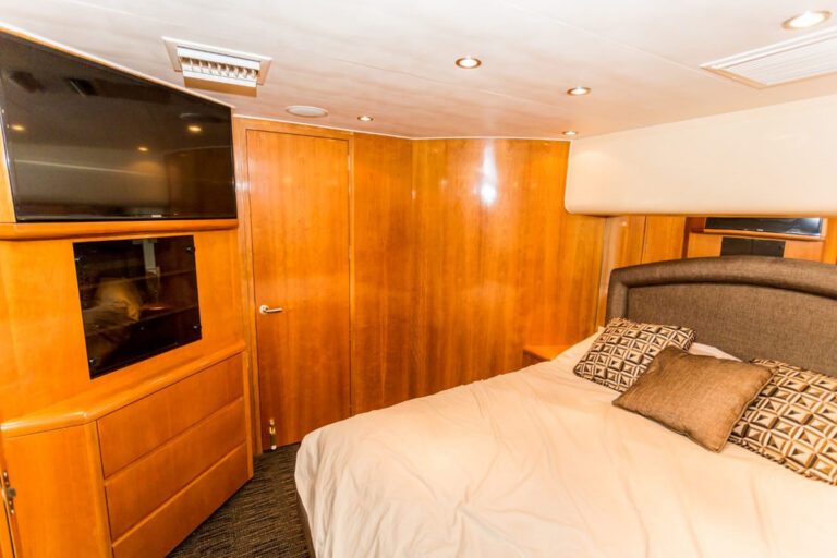 Wood-paneled stateroom on the 70' Hatteras