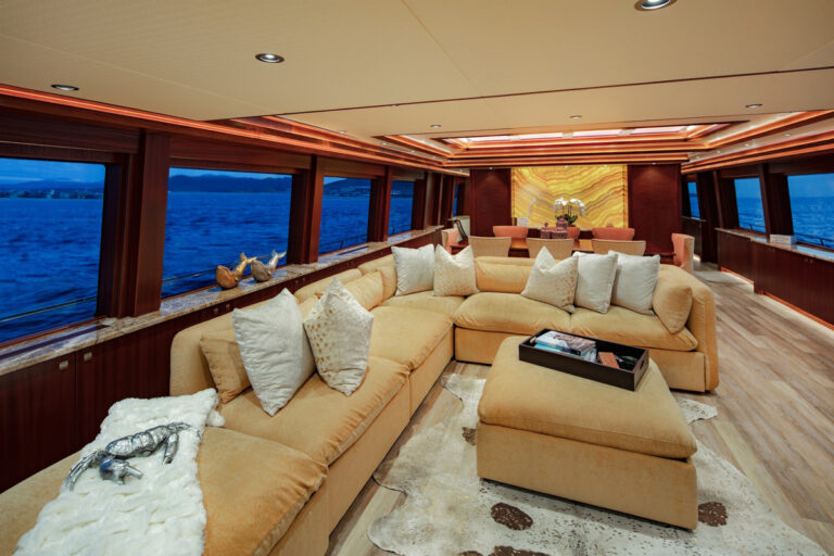 Lounge seating in the salon of the 130' luxury yacht