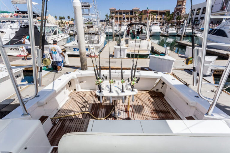 Cockpit seating and fishing rods aboard the 45' Cabo flybridge