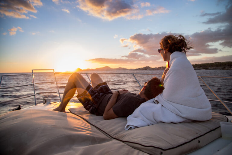 Guests relaxing on the 55' Azimut at sunset