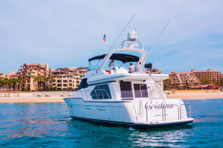 60' Bayliner at anchor off the Cabo San Lucas beachfront